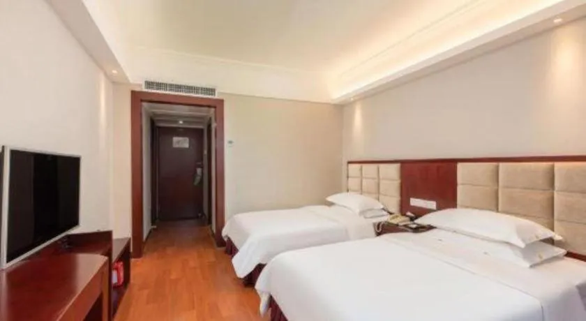 Bed in Overseas Chinese Hotel