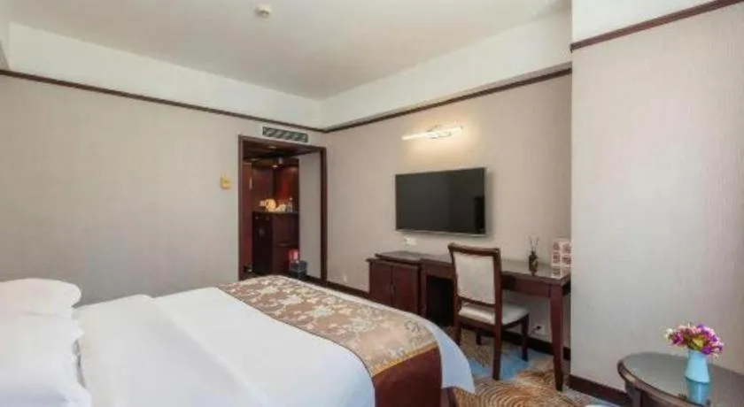 Bed in Overseas Chinese Hotel