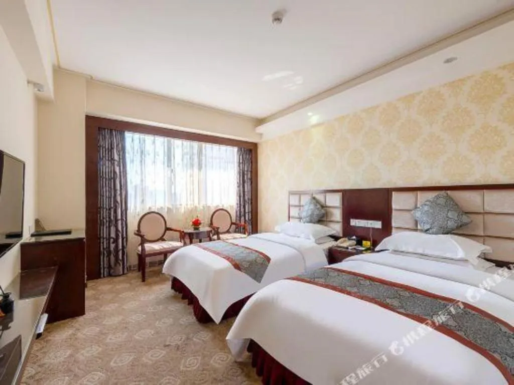 Bed in Overseas Chinese Hotel