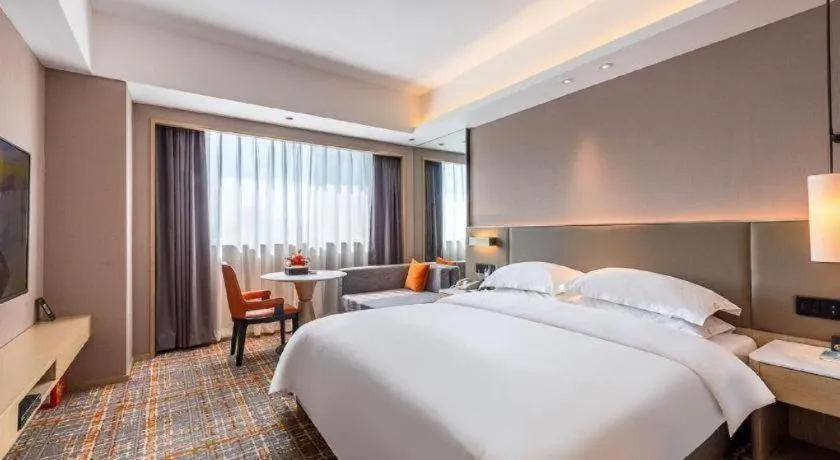 Bed in Overseas Chinese Hotel