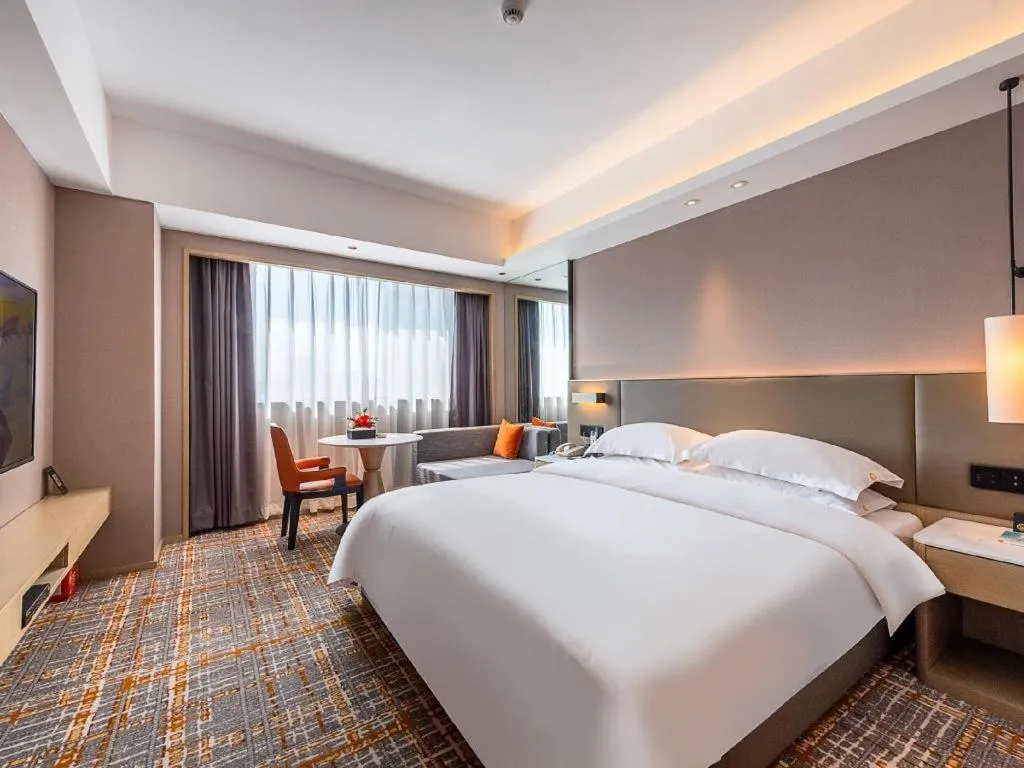 Bed in Overseas Chinese Hotel