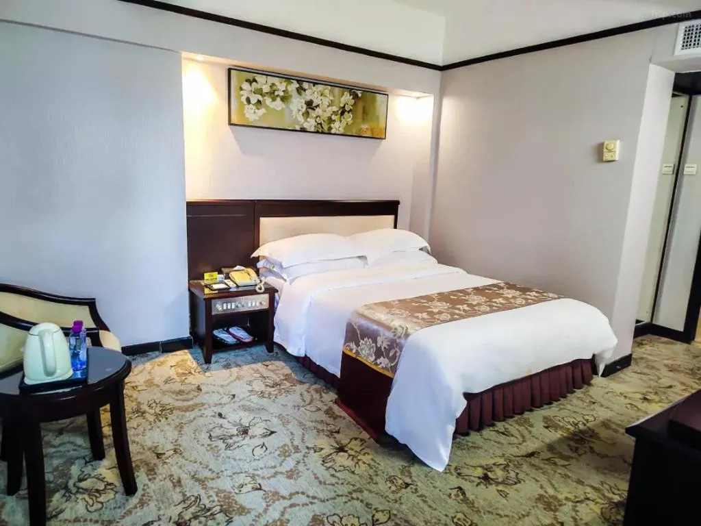 Bed in Overseas Chinese Hotel