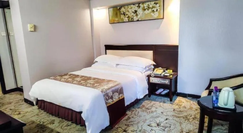 Bed in Overseas Chinese Hotel