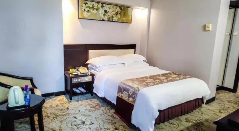 Bed in Overseas Chinese Hotel