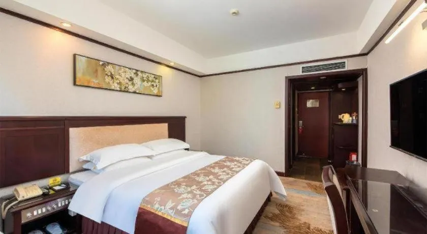 Bed in Overseas Chinese Hotel