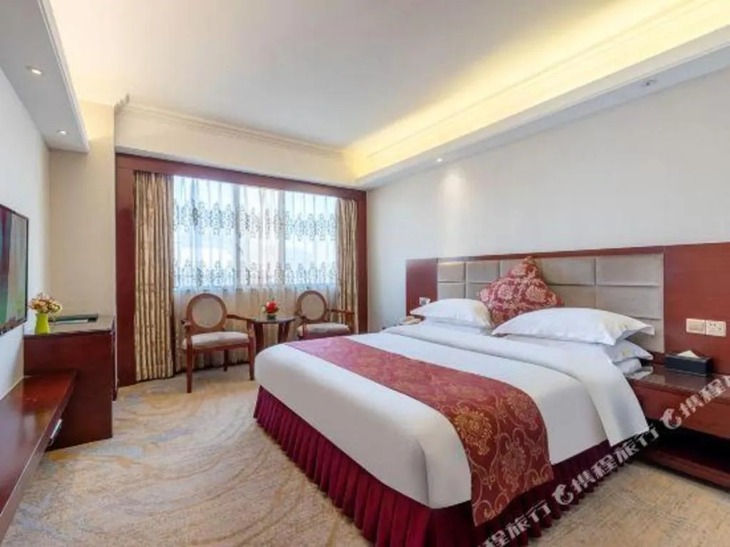 Bed in Overseas Chinese Hotel