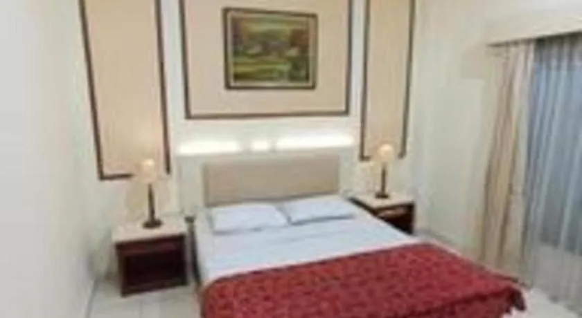 Bed in Larisae Setia Kawan Hotel