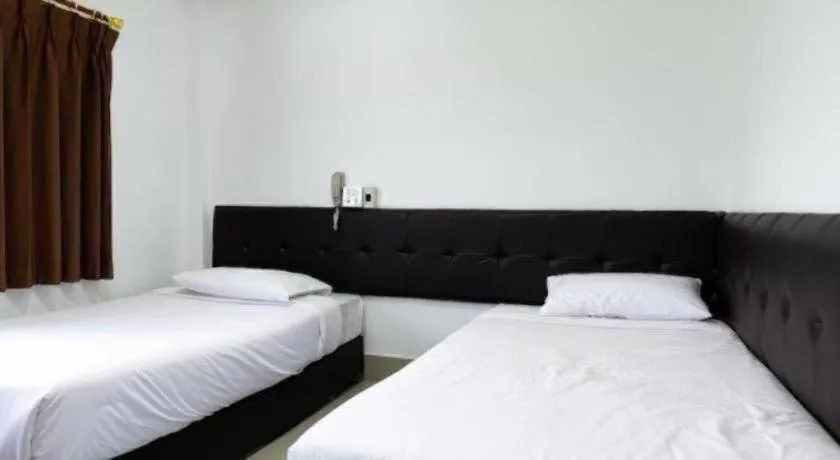 Bed in Rimnam Hotel Suk Sawat 70