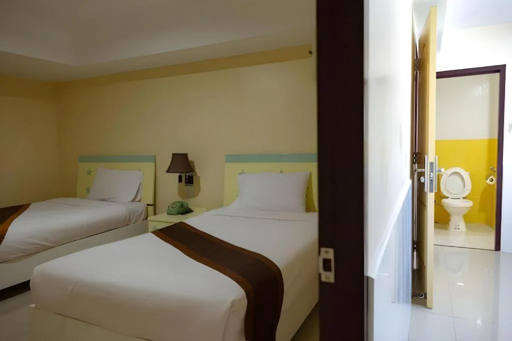 Bed in Rimnam Hotel Suk Sawat 70