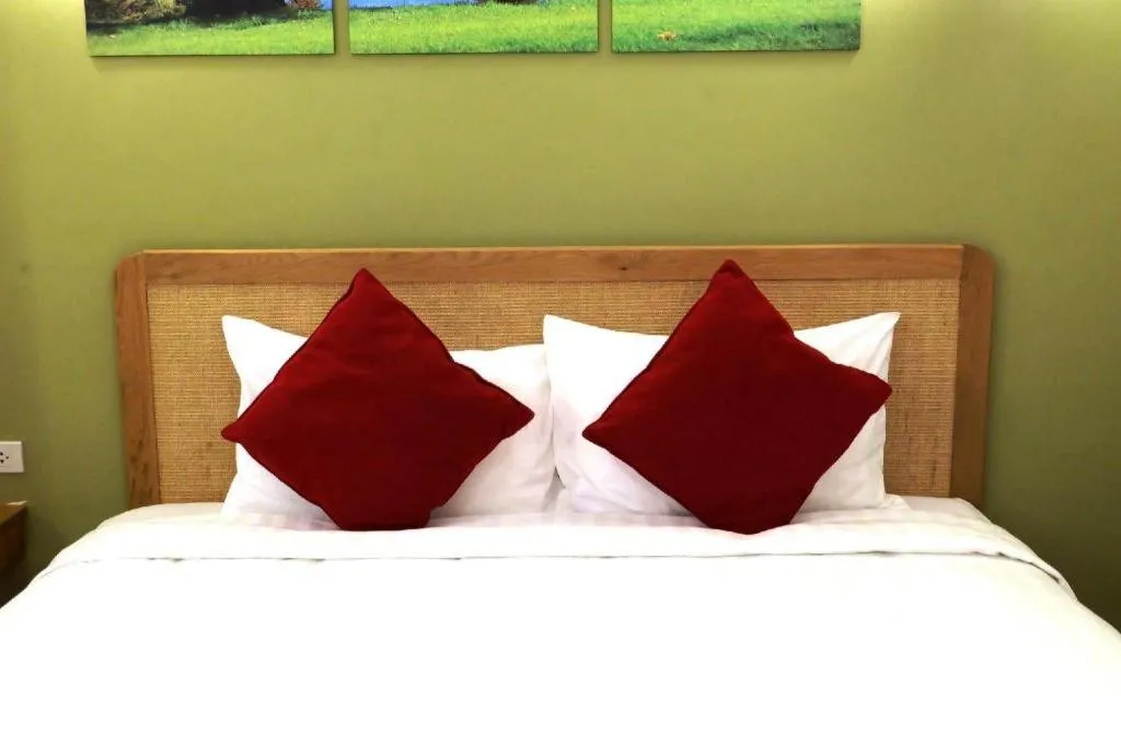 Bed in Cozy At 9 Hotel And Kitchen