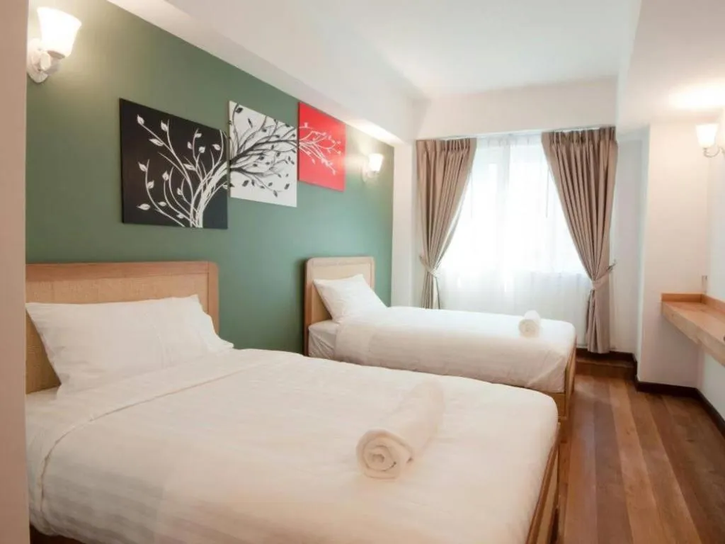 Bed in Cozy At 9 Hotel And Kitchen