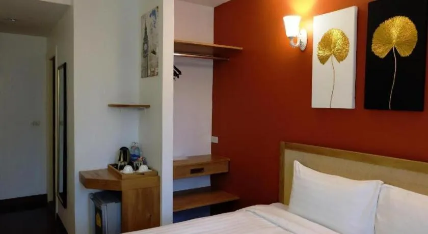 Bed in Cozy At 9 Hotel And Kitchen