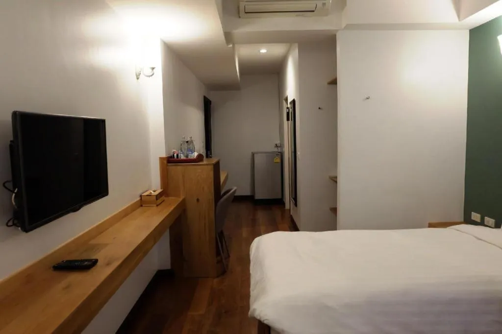 Bed in Cozy At 9 Hotel And Kitchen