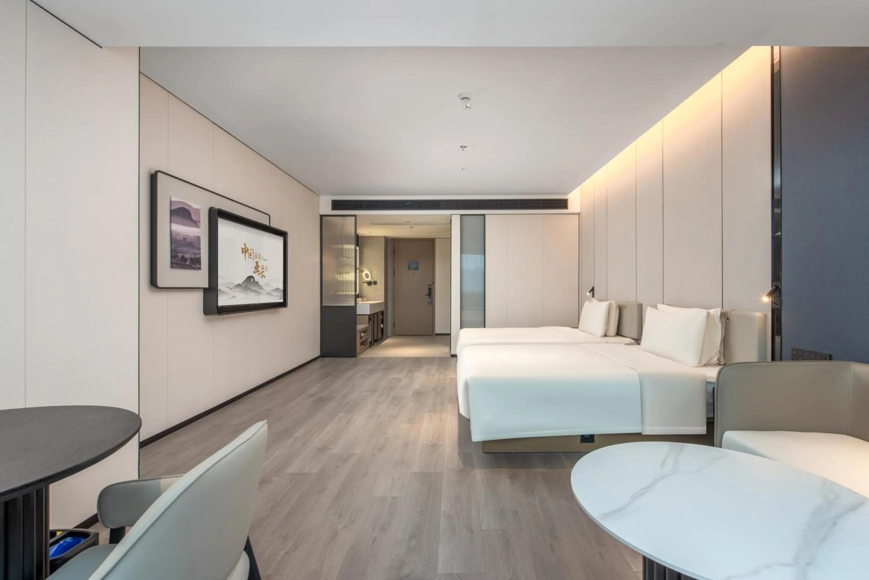 Bed in Atour Hotel Shenzhen Pingshan Kengzi Metro Station