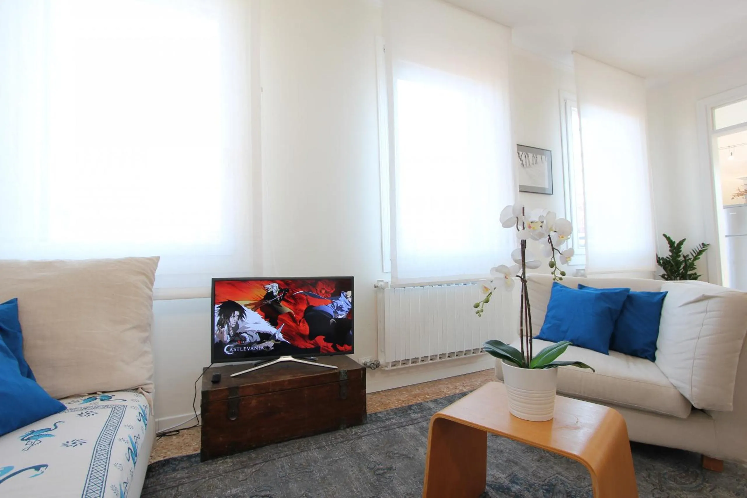 Communal lounge/ TV room in City Apartments Salute-Accademia