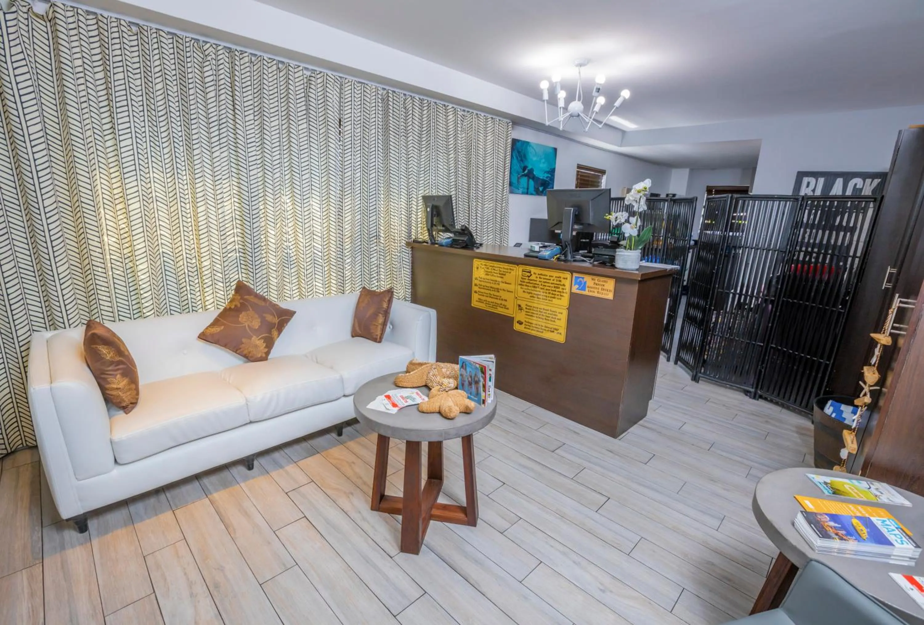 Lobby or reception in Seaside All Suites Hotel