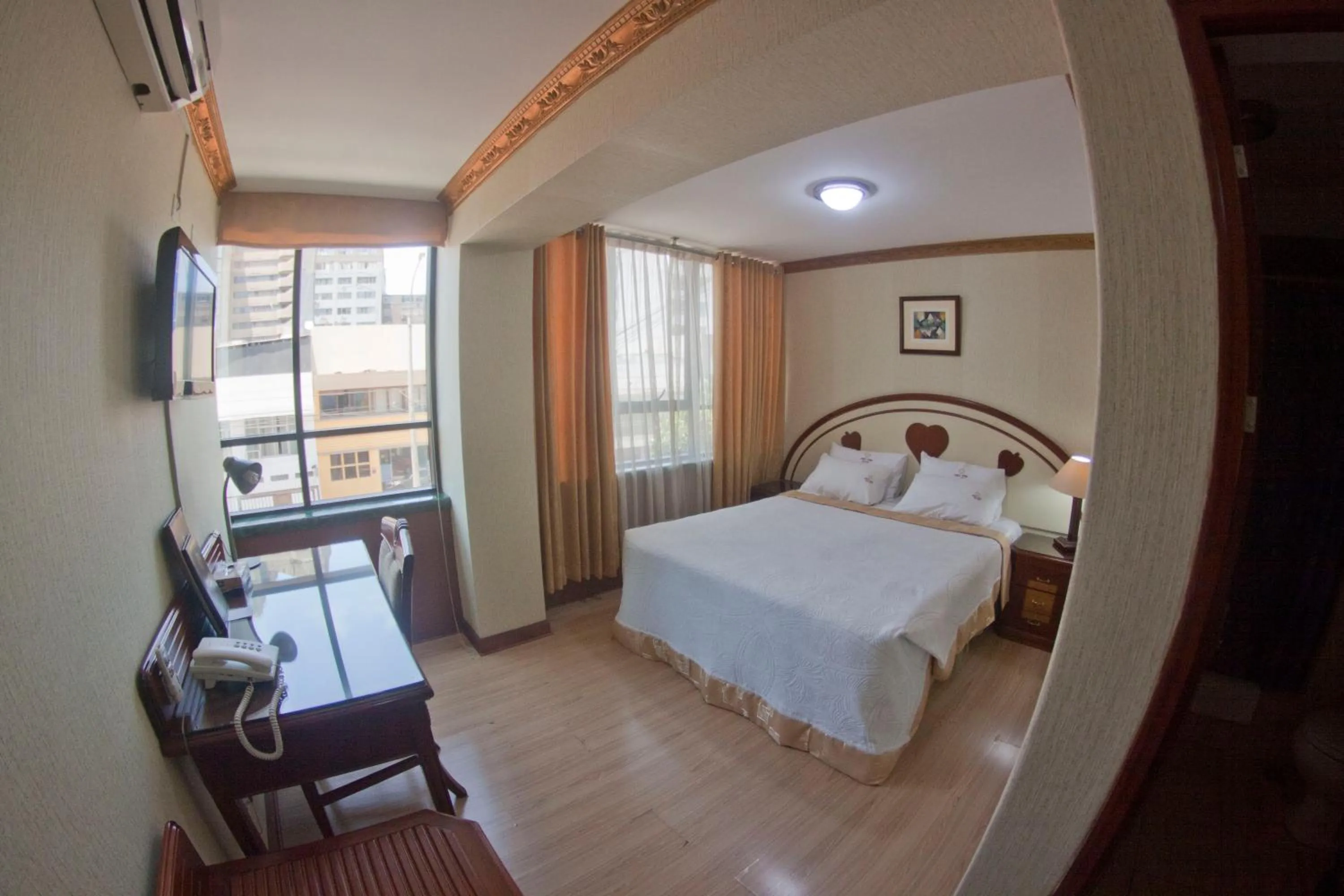 Photo of the whole room in Hotel Oro Inn