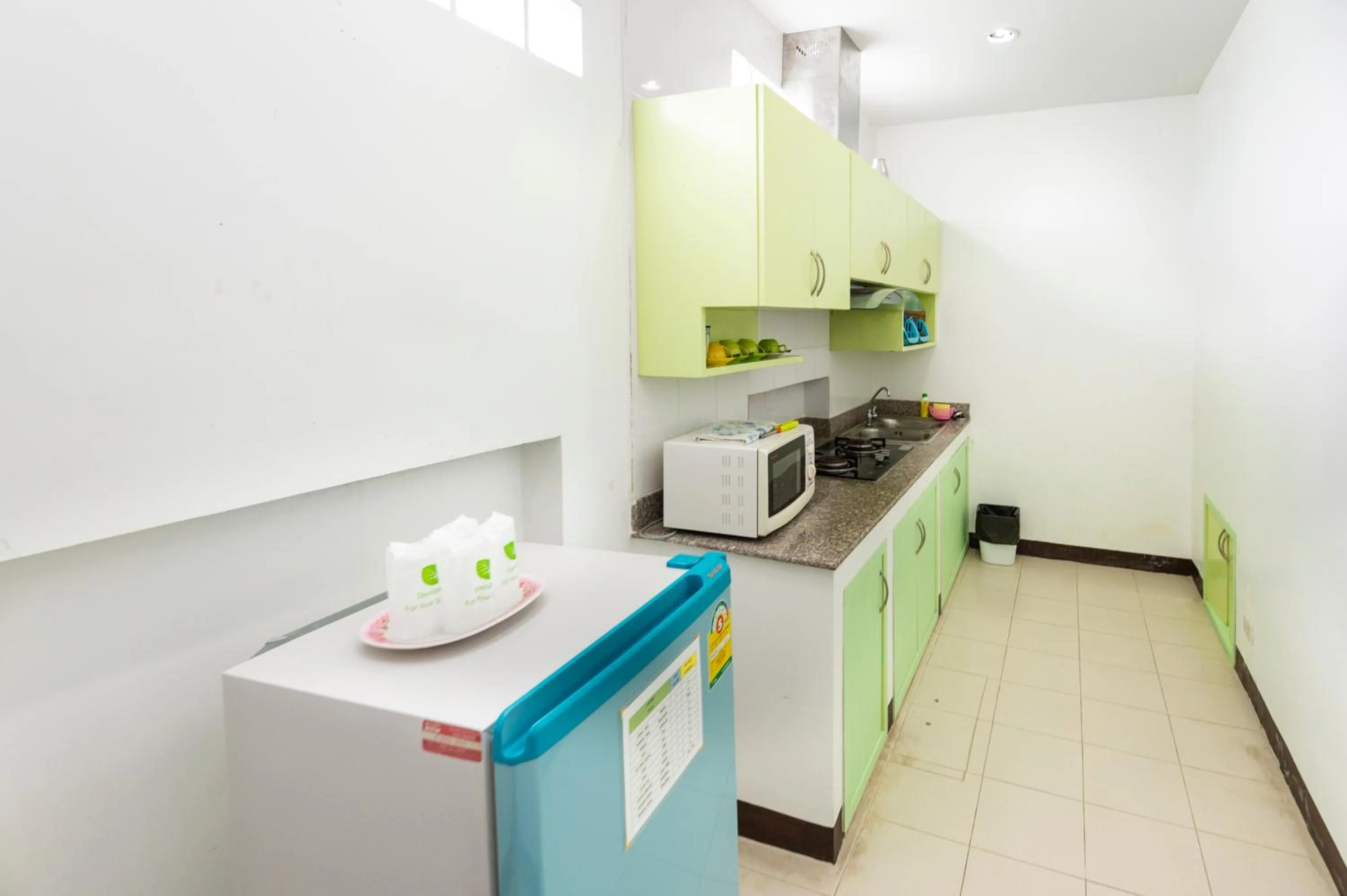 Communal kitchen in Baan Noppadol Hua Hin Resort