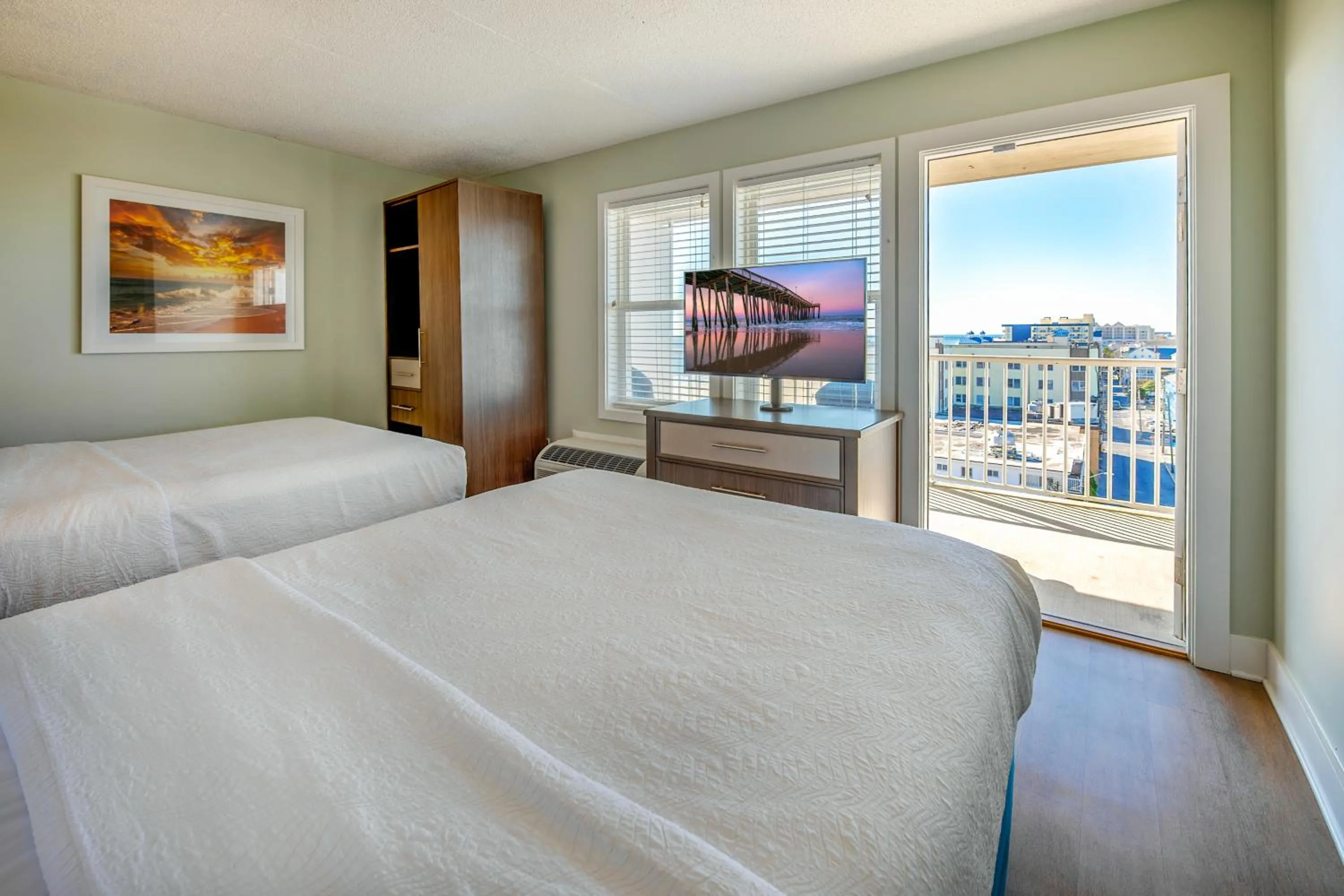 Bed in Commander Hotel & Suites