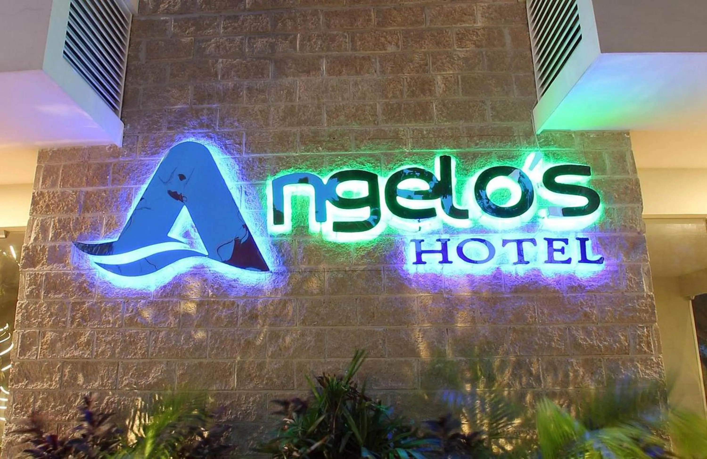 Property logo or sign in Angelo's Hotel
