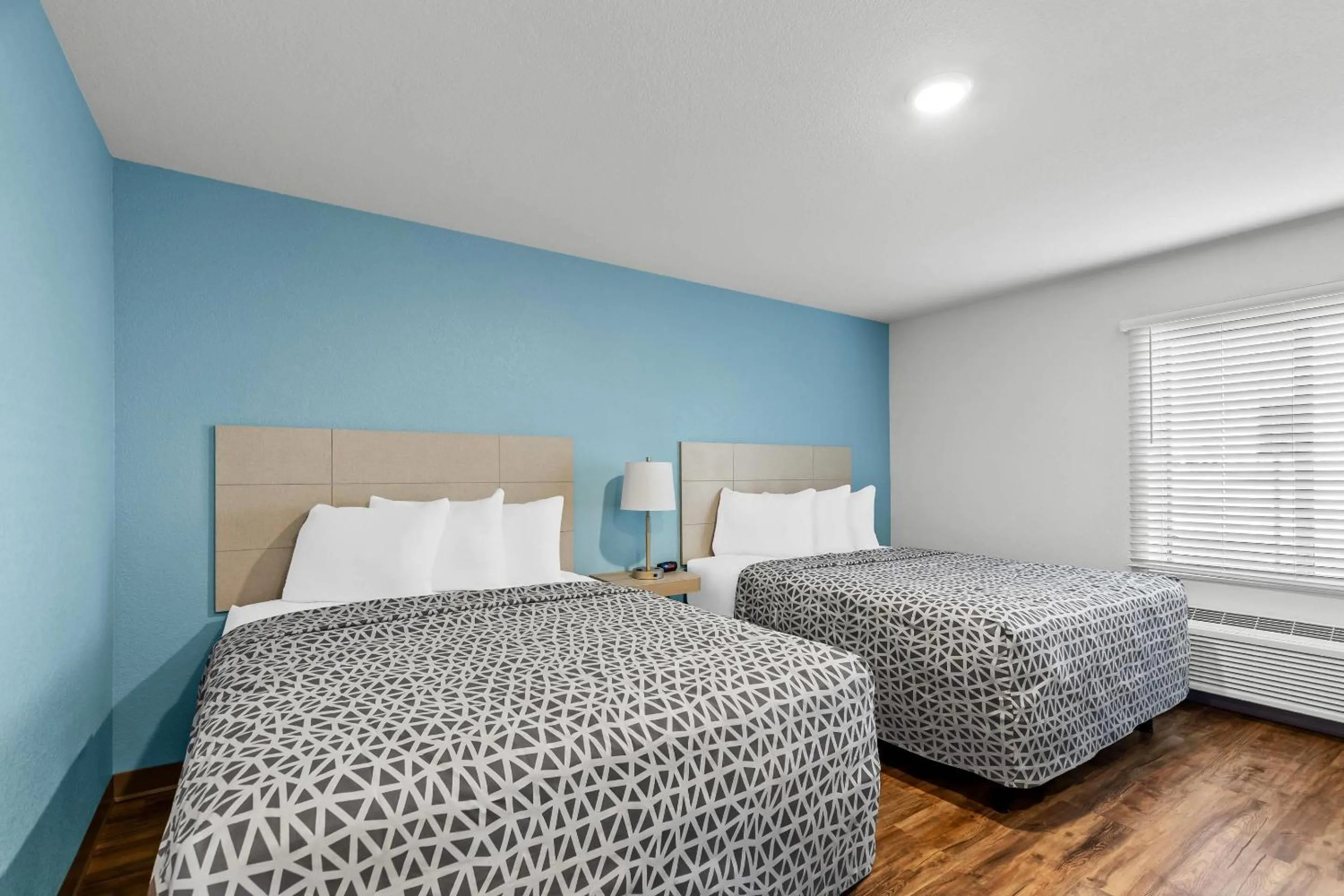 Bedroom, Bed in WoodSpring Suites St Peters-OFallon