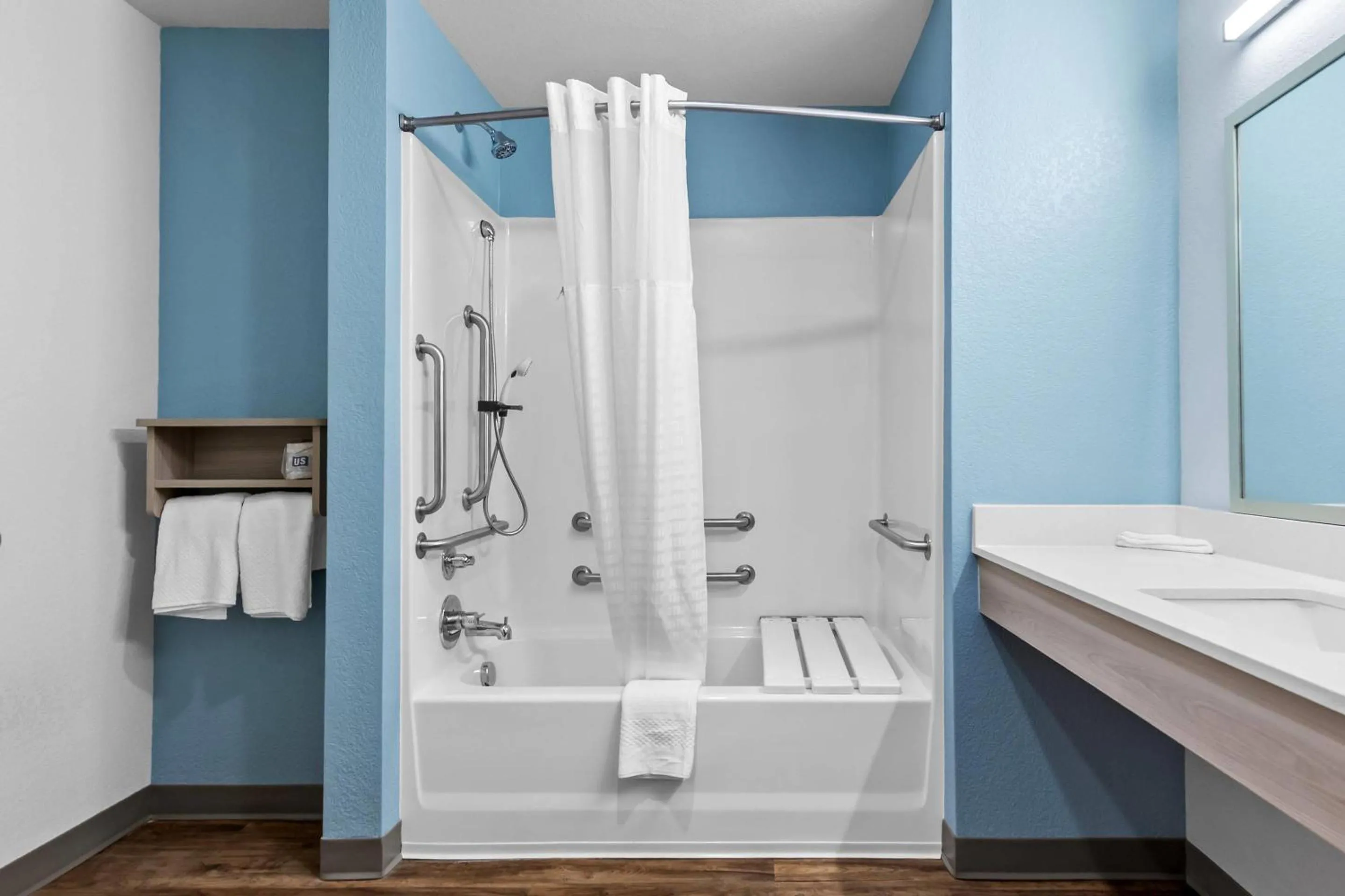 Bedroom in WoodSpring Suites St Peters-OFallon