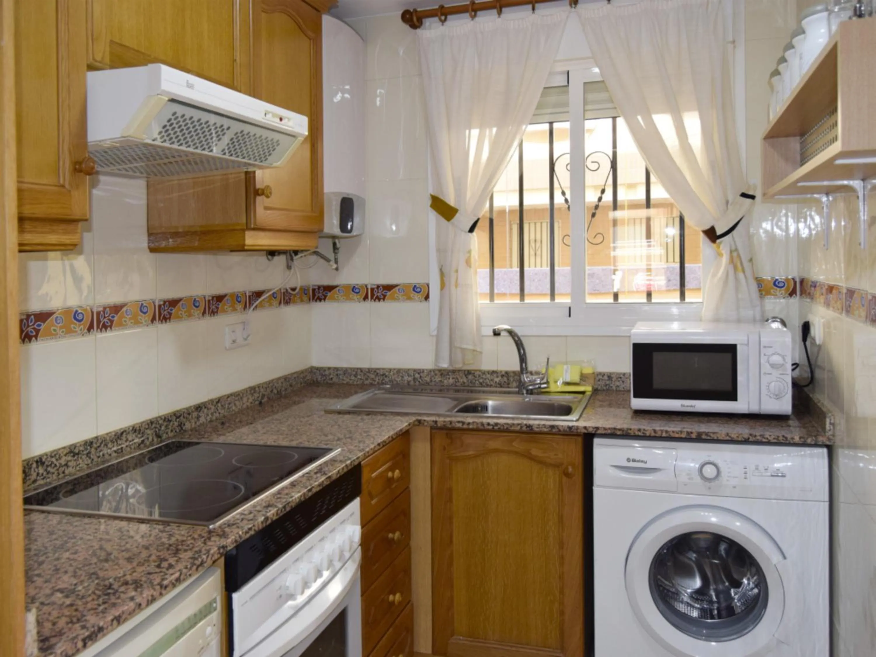 Kitchen or kitchenette in Apartamentos 3000 Marina D'Or