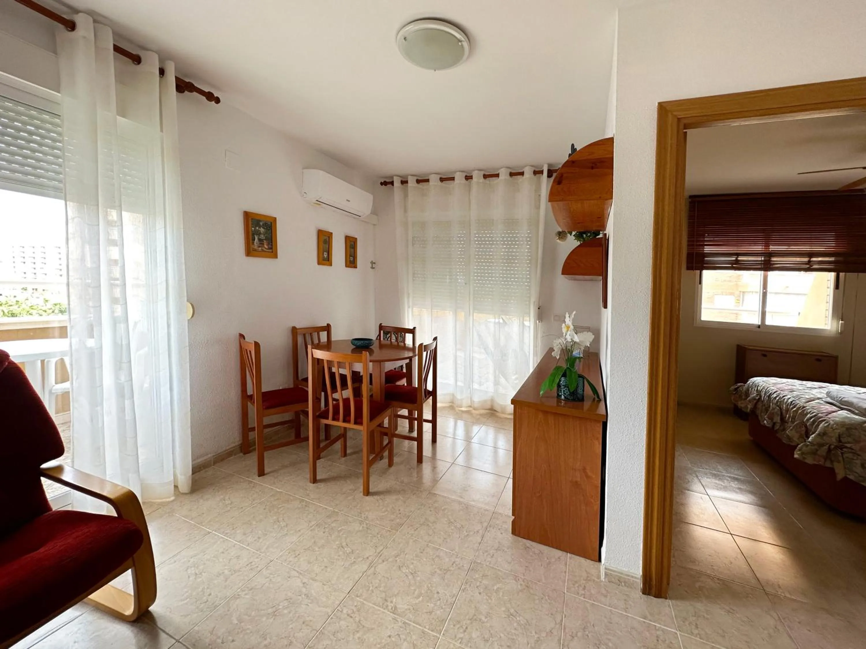 Living room, Bed in Apartamentos 3000 Marina D'Or