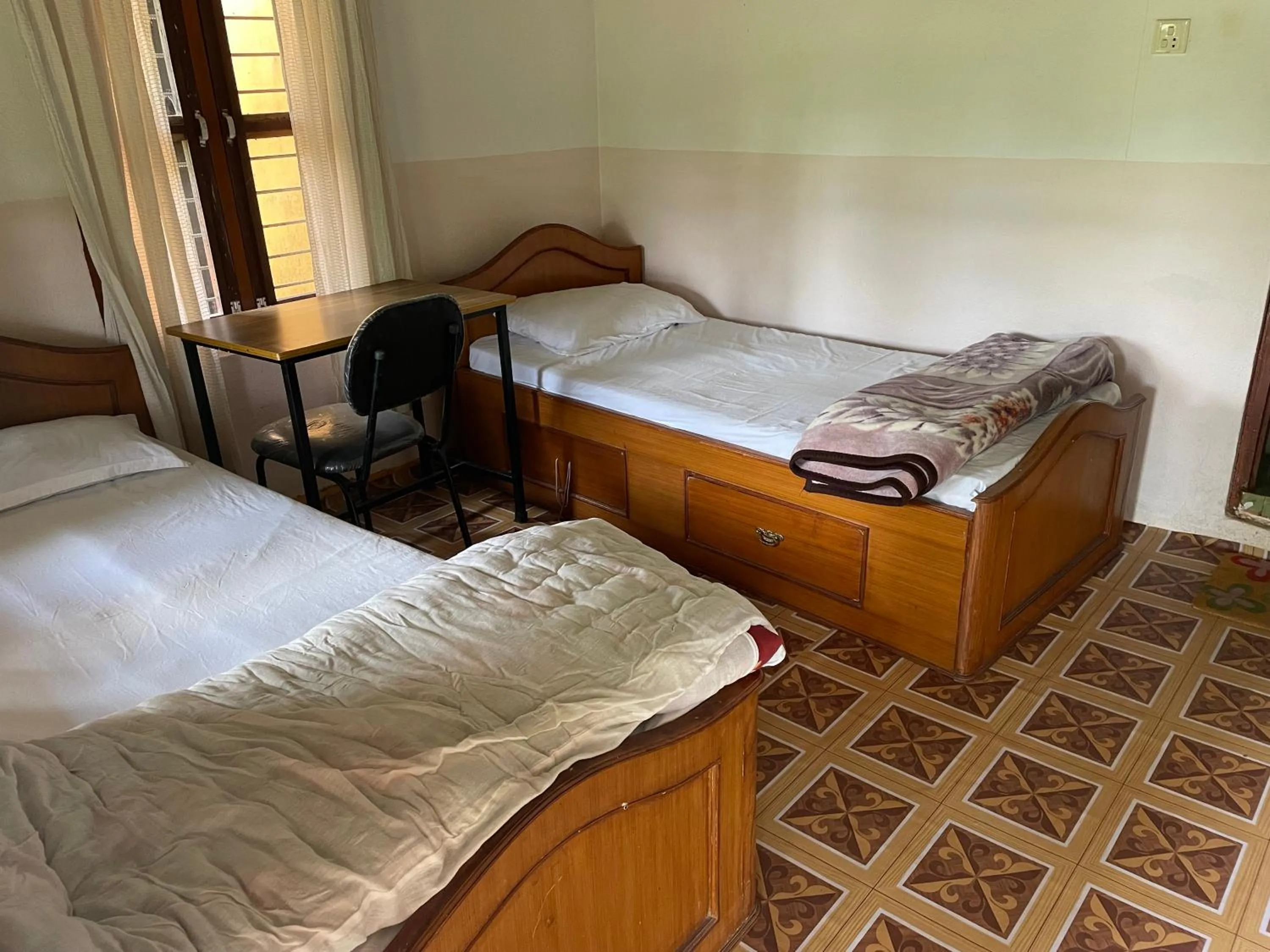 Bed in Rupa View Guest house