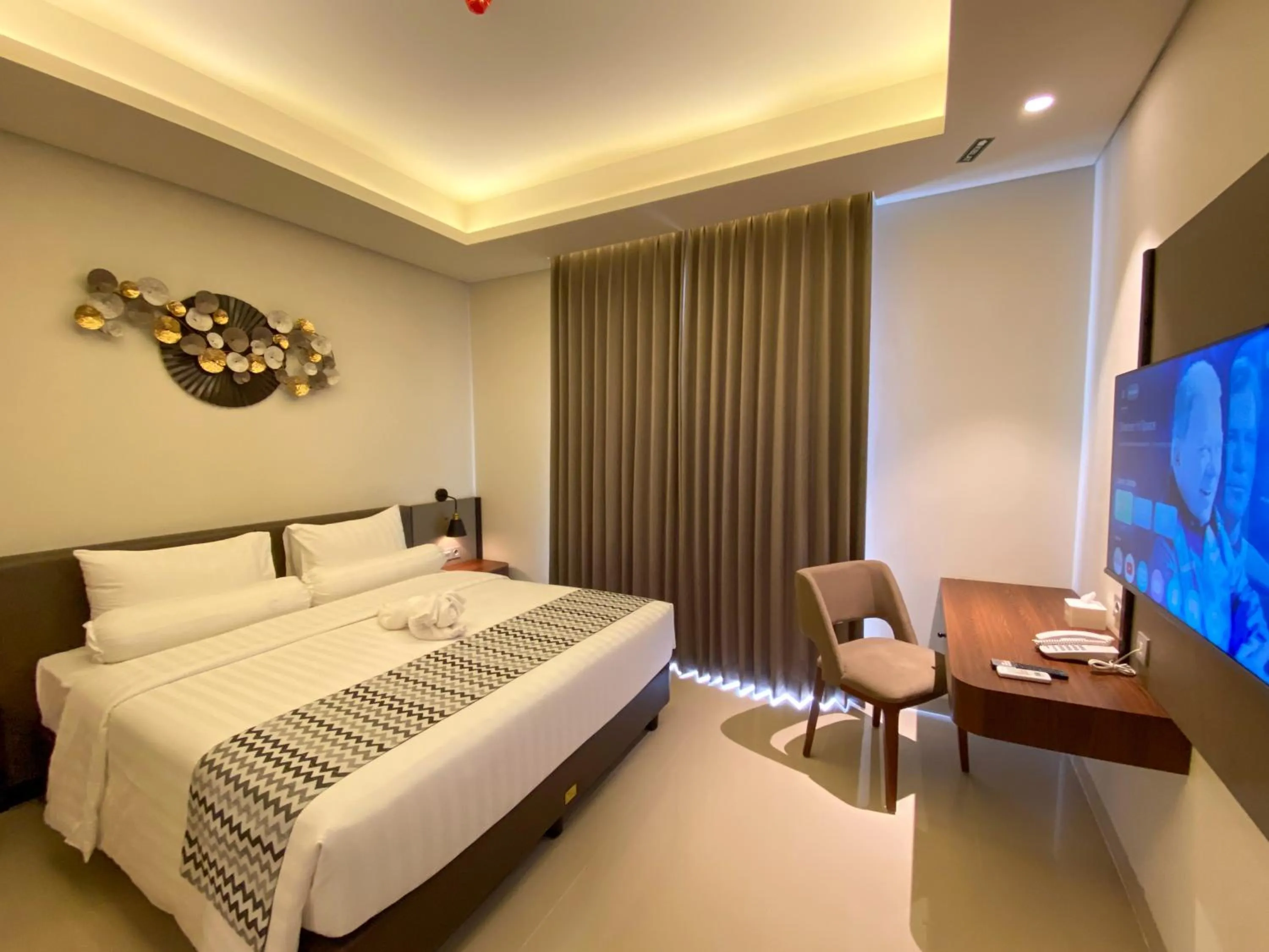 Bed in Azana Garden Hill Resort Blora