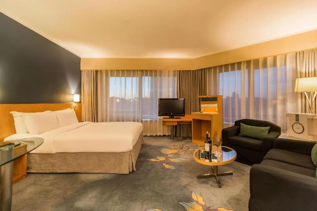 Bed in Beijing New World Center Tongpai Hotel