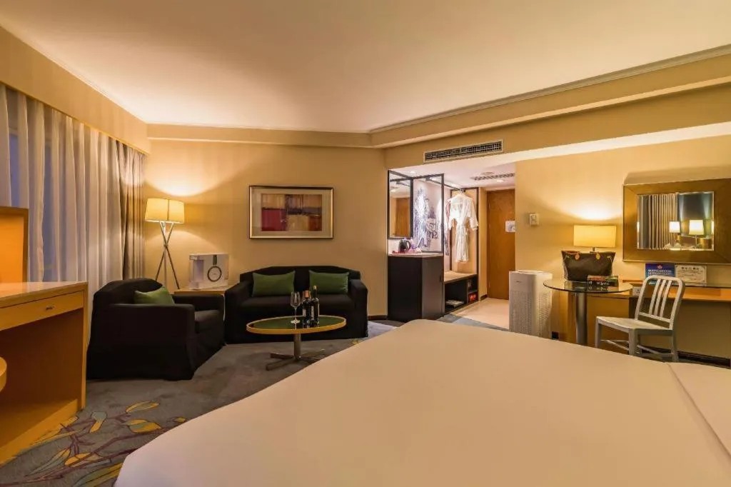 Bed in Beijing New World Center Tongpai Hotel