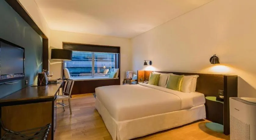 Bed in Beijing New World Center Tongpai Hotel