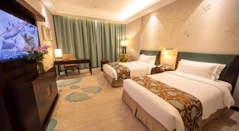 Bed in Jin Jiang Nanjing Hotel