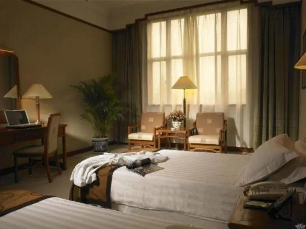 Bed in Jin Jiang Nanjing Hotel