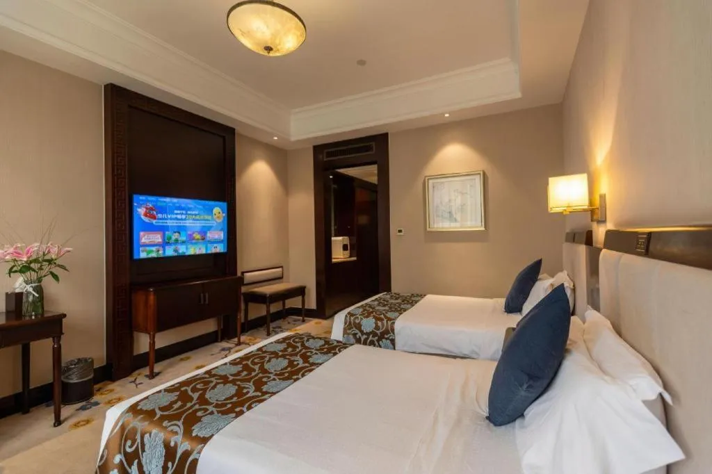 Bed in Jin Jiang Nanjing Hotel