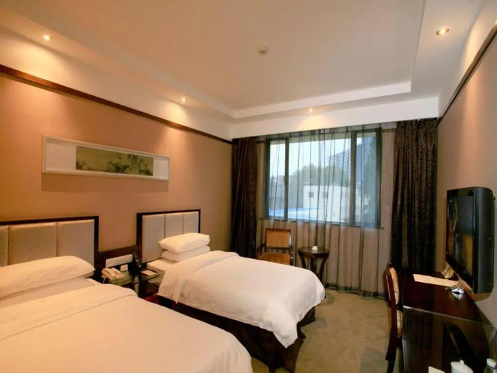 Bed in Jin Jiang Nanjing Hotel