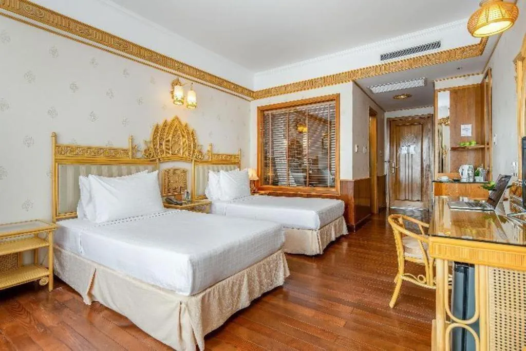 Bed in Senriver Hotel