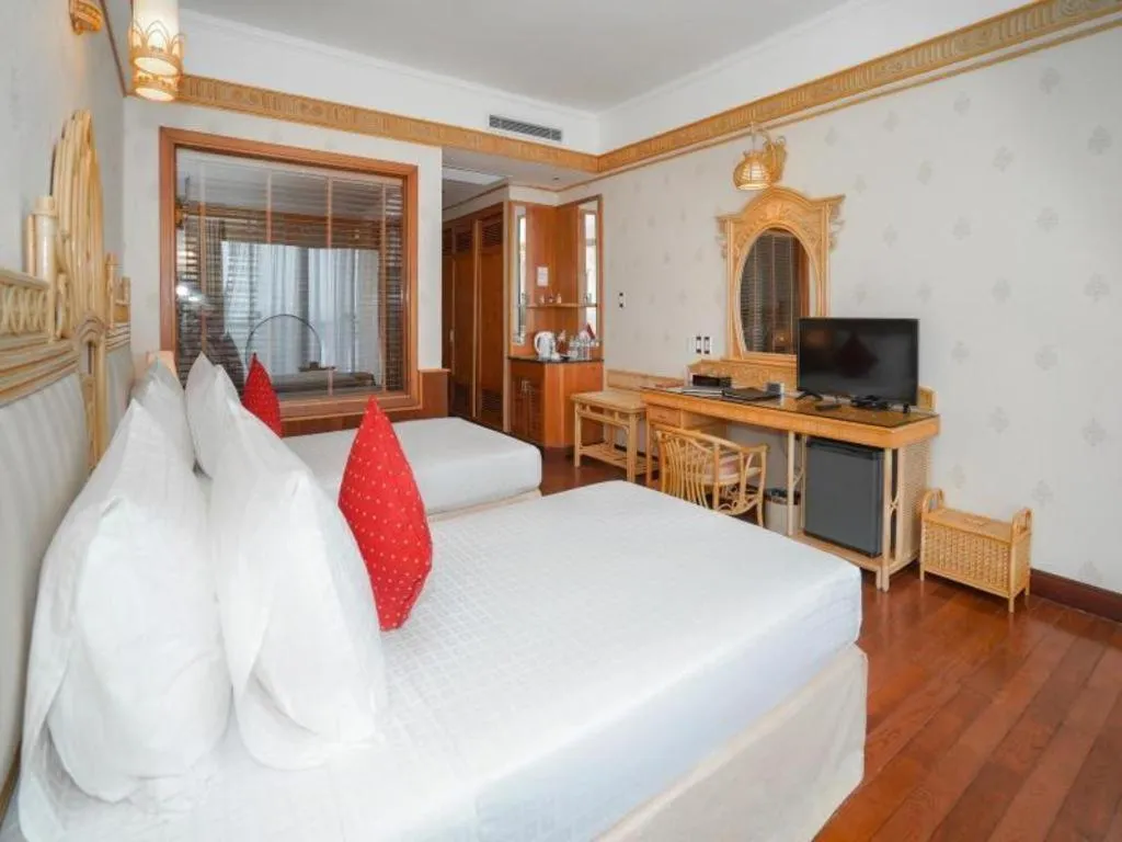 Bed in Senriver Hotel