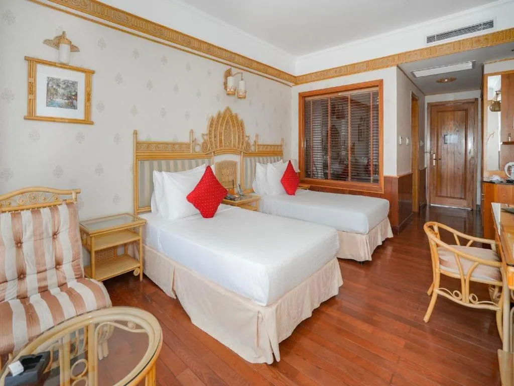 Bed in Senriver Hotel