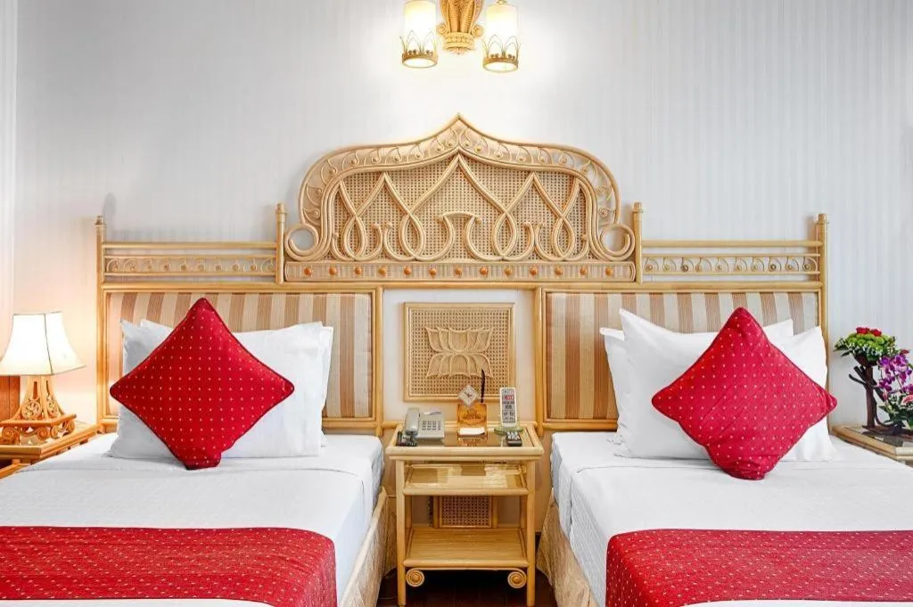 Bed in Senriver Hotel