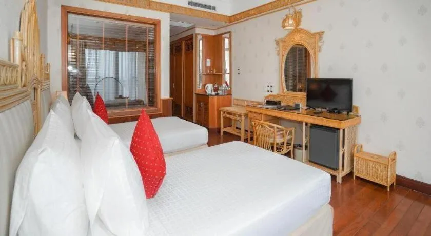 Bed in Senriver Hotel