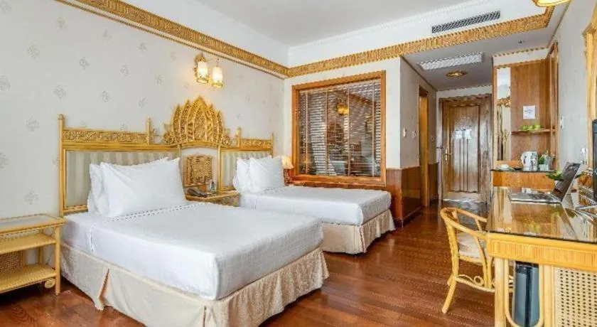 Bed in Senriver Hotel