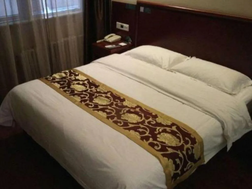 Bed in GreenTree Alliance Beijing Tiantan DonGMEn Hotel