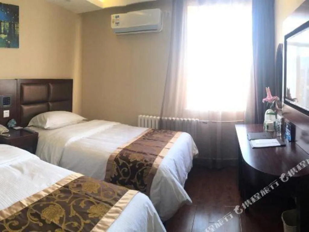 Bed in GreenTree Alliance Beijing Tiantan DonGMEn Hotel