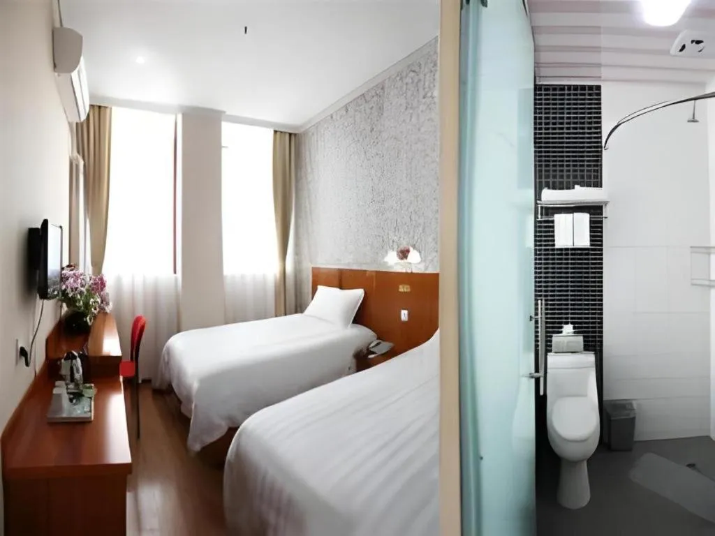 Bed in GreenTree Alliance Beijing Tiantan DonGMEn Hotel