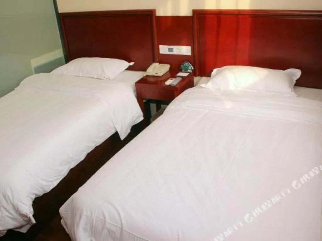 Bed in GreenTree Alliance Beijing Tiantan DonGMEn Hotel