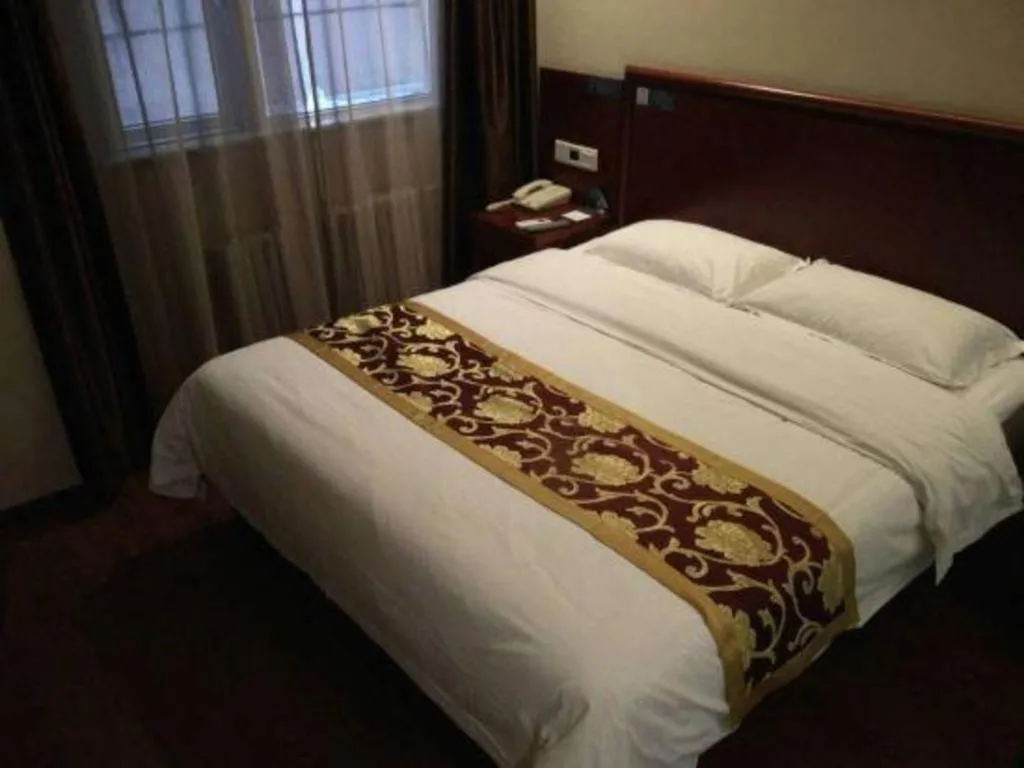 Bed in GreenTree Alliance Beijing Tiantan DonGMEn Hotel