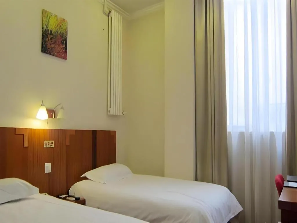 Bed in GreenTree Alliance Beijing Tiantan DonGMEn Hotel