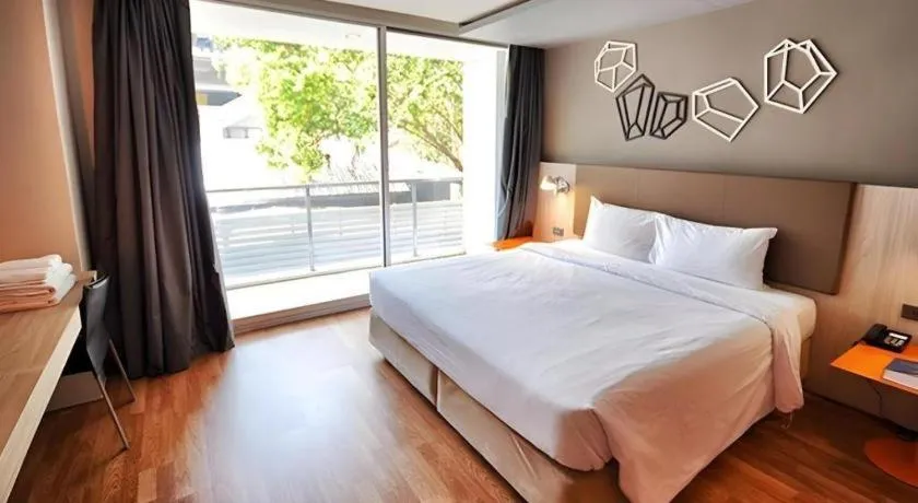 Bed in The Heritage Silom Hotel